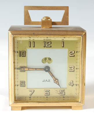 Lot 230 - An Art Deco Jaz travel alarm clock, the square...