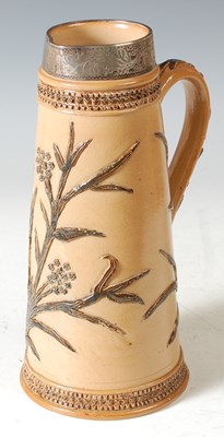 Lot 240 - A Doulton Lambeth stoneware jug, by Frank A....