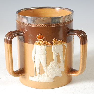 Lot 241 - Golfing interest: a Doulton Lambeth silver...