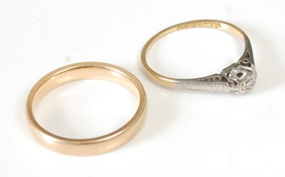 Lot 64 - An 18ct gold wedding ring, size L, 3.3 grams,...