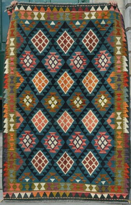 Lot 784 - A Maimana Kilim rug, the green and black...