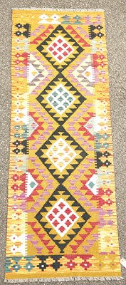 Lot 780 - A Maimana Kilim runner, the ochre coloured...