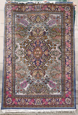Lot 810 - A Persian Tabriz type rug, the light grey...