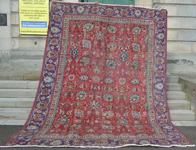 Lot 804 - An antique Persian Tabriz carpet, the...