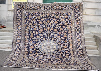 Lot 803 - A fine Persian Kashan carpet, the rectangular...