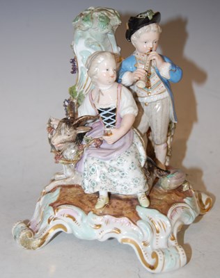 Lot 262 - A Meissen porcelain figure group, boy girl and...