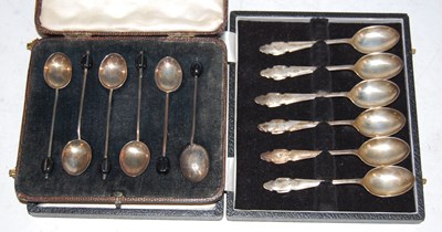 Lot 259 - A cased set of Birmingham silver coffee spoons...