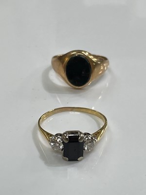 Lot 264 - An 18ct gold sapphire and diamond three stone...