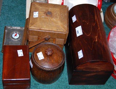 Lot 409 - A group of treen ware comprising a dark wood...
