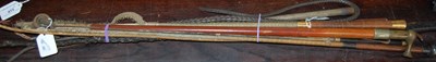 Lot 412 - A collection of riding crops to include an...