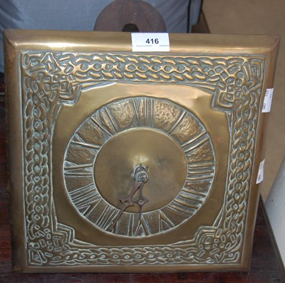 Lot 416 - A Glasgow style brass Arts and Crafts 'Wag on...