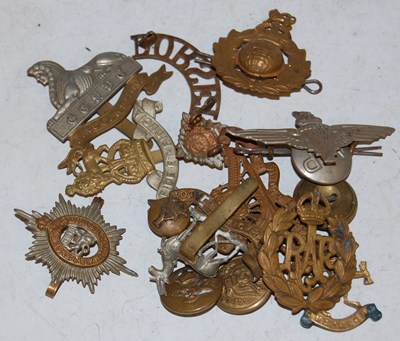 Lot 260 - Militaria interest - A group of assorted cap...