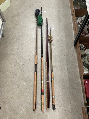 Lot 426A - A collection of fishing rods to include 15'...