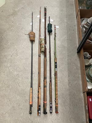 Lot 426B - A collection of fishing rods to include 15'...