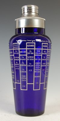Lot 153 - A white metal mounted Art Deco cobalt blue glass cocktail shaker