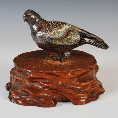 Lot 259 - A Japanese white metal and enamel model of a...