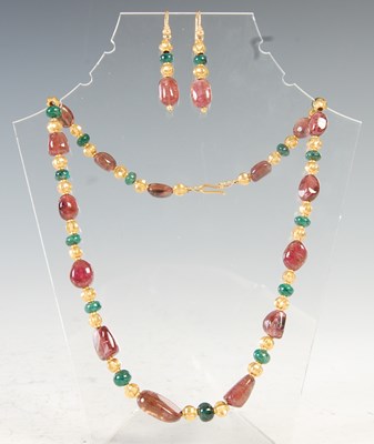 Lot 518 - A suite of Indian yellow metal, pink tourmaline and emerald jewellery