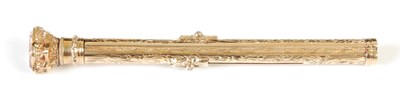 Lot 461 - A late 19th/ early 20th century yellow metal combination propelling pencil/ pen