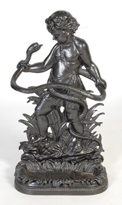 Lot 819 - A cast iron cherub and serpent stick stand,...
