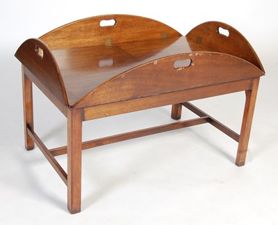 Lot 57 - A George III style mahogany and brass butlers tray coffee table