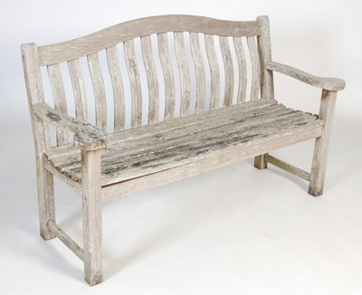 Lot 112 - A teak garden bench, 20th century