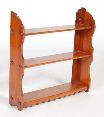 Lot 6 - An early 20th century mahogany three-tier...
