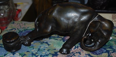 Lot 331 - A bronzed figure of an elephant.
