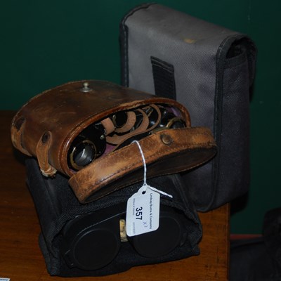 Lot 357 - A leather cased set of vintage prism...