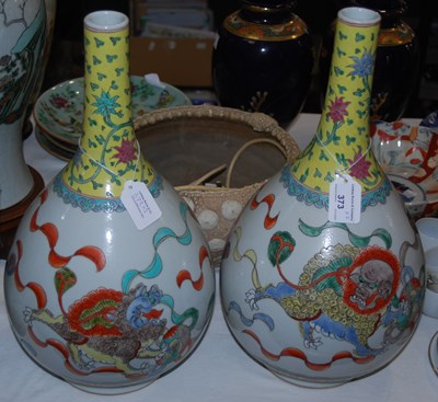 Lot 373 - A pair of Chinese porcelain bottle vases, 20th...