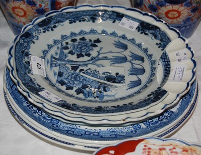 Lot 379 - A group of six blue and white ceramic plates,...