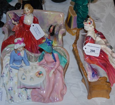 Lot 396 - A group of three Royal Doulton seated ladies...