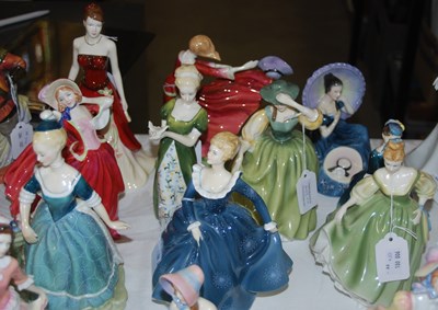 Lot 403 - A group of ten Royal Doulton lady figures...