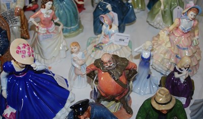 Lot 404 - A group of seven Royal Doulton figures...