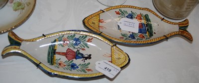 Lot 419 - Two Henri Quimper fish-shaped dishes.