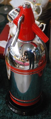 Lot 470 - A Sparklets Limited chrome plated soda syphon...