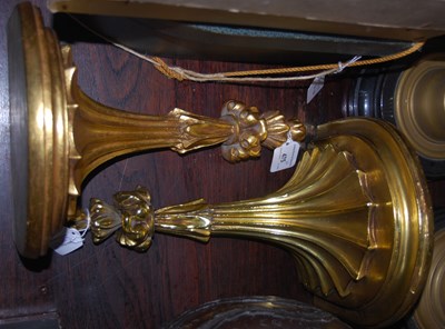 Lot 475 - A pair of composite gilt-coloured wall brackets.