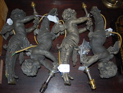 Lot 482 - A set of four composite wall lights in the...