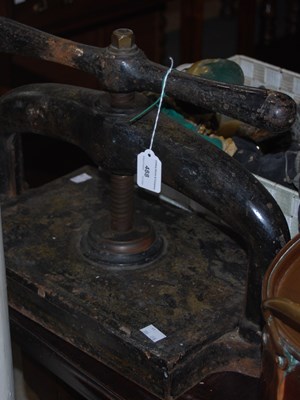 Lot 488 - A Victorian cast iron book press.