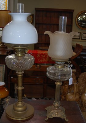 Lot 497 - A late 19th/ early 20th century brass oil lamp...