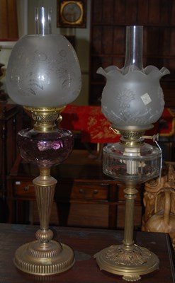 Lot 498 - A late 19th/ early 20th century brass oil lamp,...