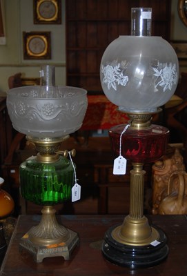 Lot 501 - A late 19th/ early 20th century brass oil lamp,...