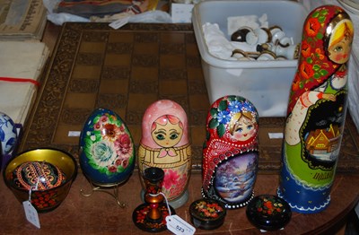 Lot 523 - Three assorted Russian lacquered dolls,...