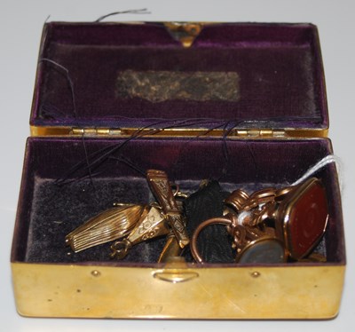 Lot 32 - A late 19th century yellow metal and carnelian...