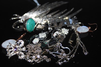 Lot 39 - A collection of assorted white metal and...
