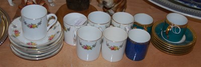 Lot 560 - A gilt and floral decorated part coffee set...