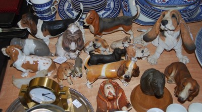 Lot 561 - A collection of Basset Hound figures to...