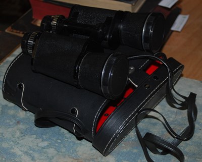 Lot 570 - A black cased set of binoculars by Hanimex,...