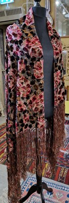 Lot 580 - A pink, black and gold patterned shawl,...