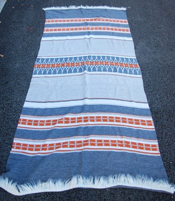 Lot 582 - A grey, white and orange coloured blanket,...