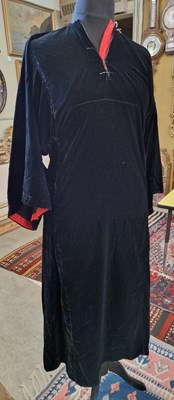 Lot 584 - An East European black velvet robe.
